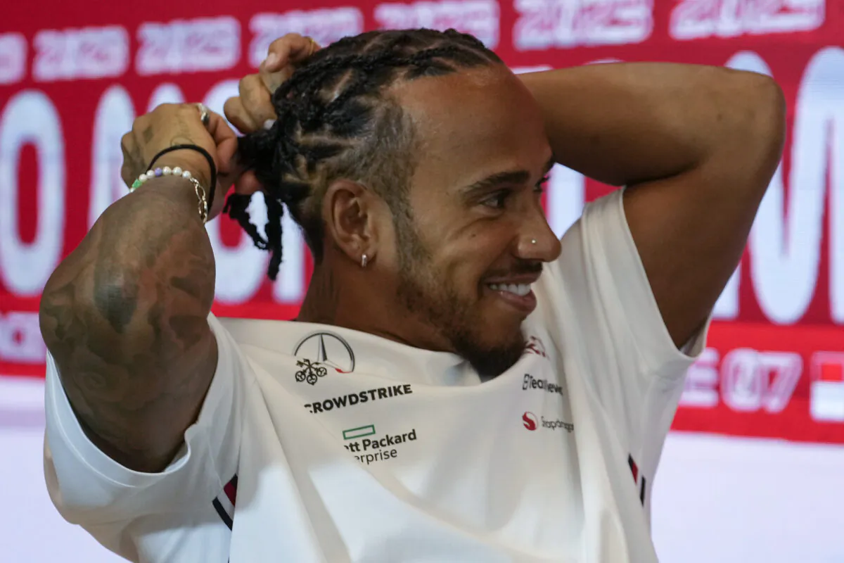 Mercedes driver Lewis Hamilton of Britain gestures during a news conference at the Monaco racetrack in Monaco on May 25, 2023. (Luca Bruno/AP Photo)
