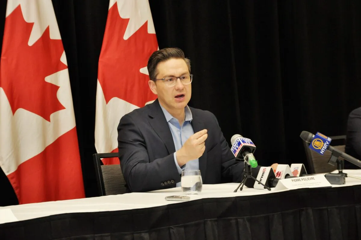 Conservative Party Leader Pierre Poilievre speaks to reporters at a media roundtable event in Toronto on May 24, 2023. (Allen Zhou/The Epoch Times)