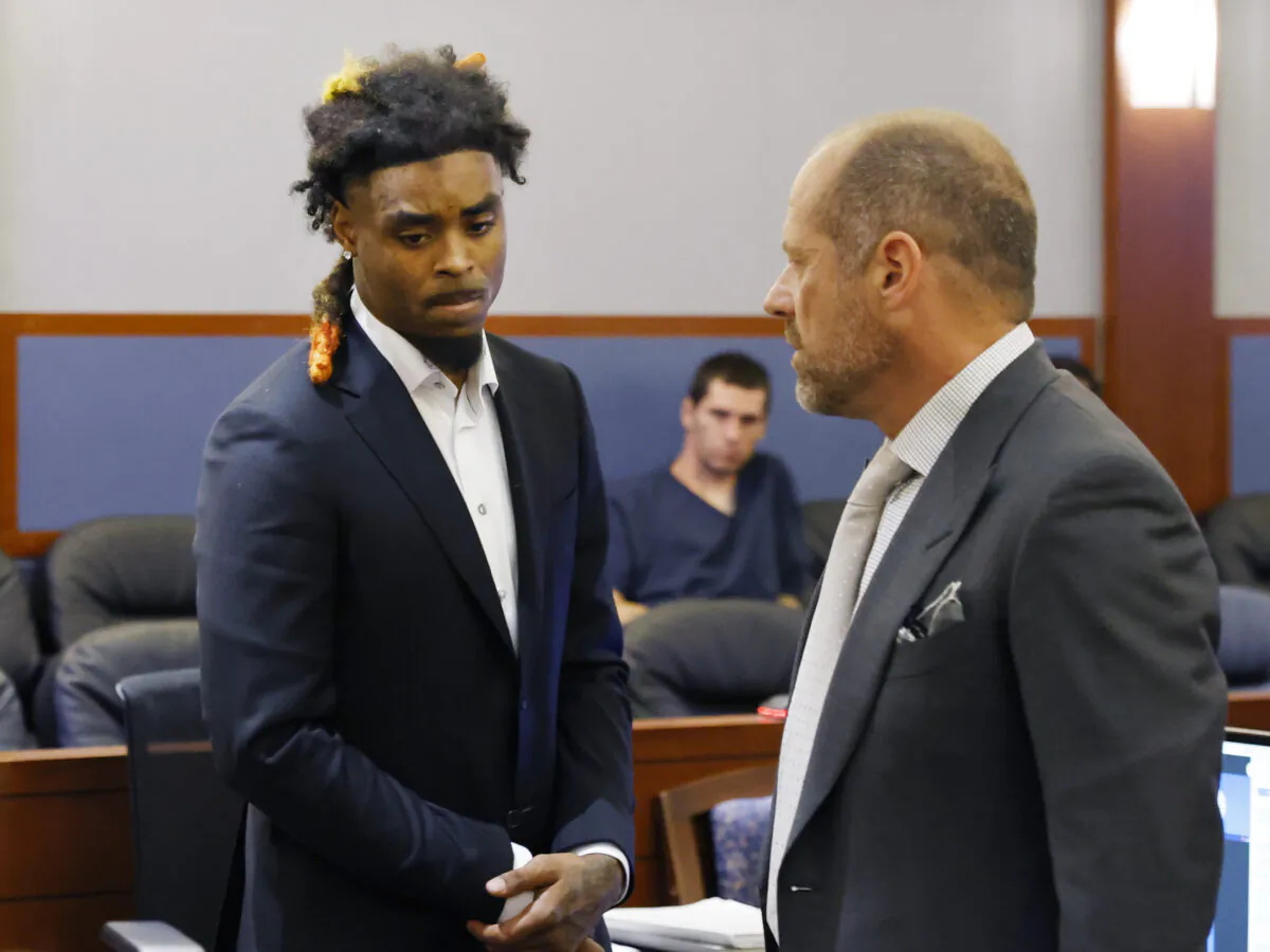 Former NFL cornerback Damon Arnette (L) leaves the courtroom with his attorney Ross Goodman following his arraignment at the Regional Justice Center in Las Vegas on May 24, 2023. (Bizuayehu Tesfaye/Las Vegas Review-Journal via AP)
