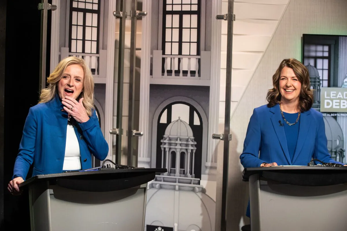 Leader of the NDP Rachel Notley (L) and Leader of the United Conservative Party Danielle Smith prepare for a debate in Edmonton on May 18, 2023. (Jason Franson/The Canadian Press)