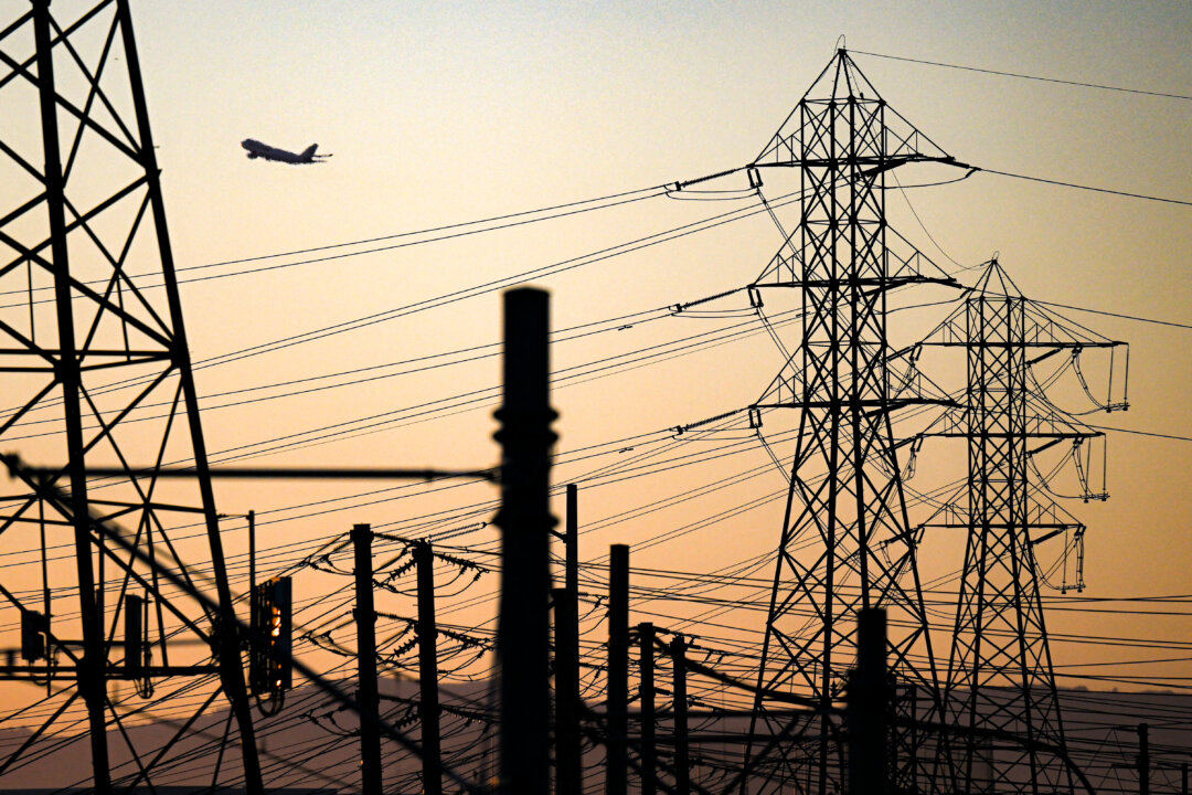 Electric power lines at sunset in El Segundo, Calif., on Aug. 31, 2022. (PATRICK T. FALLON/AFP via Getty Images)