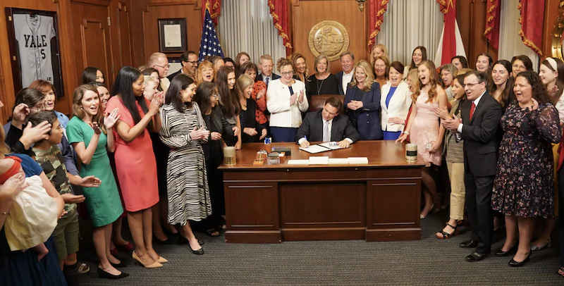 Florida Gov. Ron DeSantis signs the newly adopted Florida Heartbeat Protection Act. (Florida Governor’s Office)
