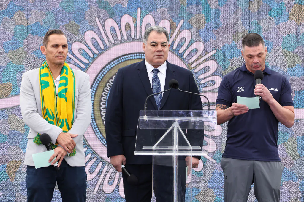 Chair of Football Australia’s National Indigenous Advisory Committee Jade North, Mal Meninga and Jamie Pittman speak on stage during a media opportunity with Australian sports governing body representatives who will support the Voice, at North Sydney Oval in Sydney, Australia on May 26, 2023. (Mark Metcalfe/Getty Images)