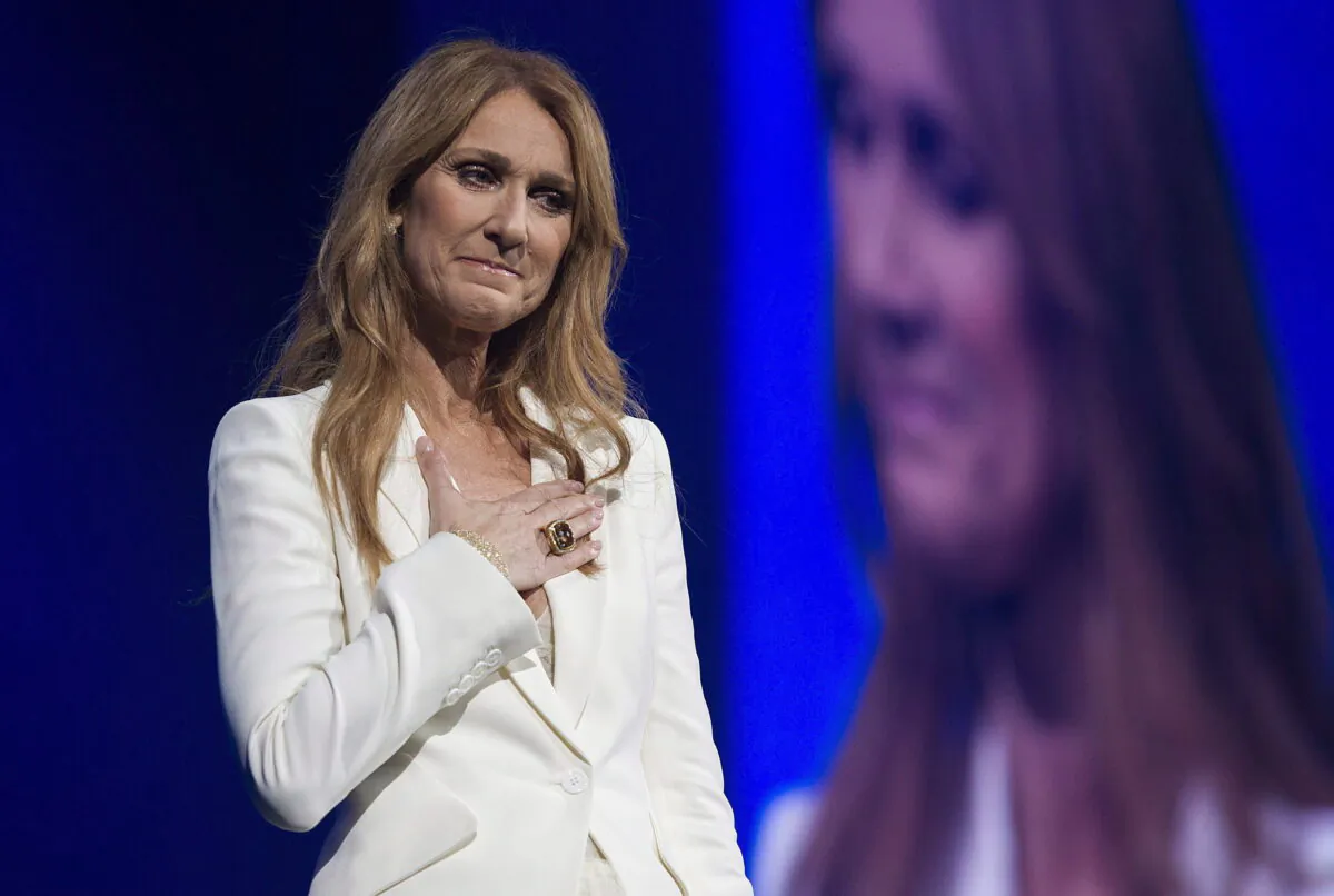 Celine Dion gestures as she performs at the Bell Centre in Montreal, on July 31, 2016. (The Canadian Press/Graham Hughes)