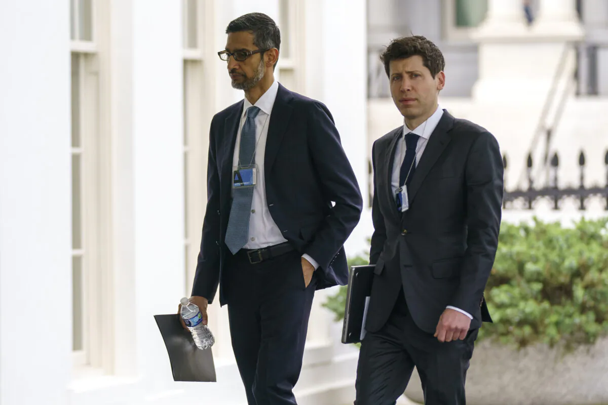 Alphabet CEO Sundar Pichai (L) and OpenAI CEO Sam Altman arrive to the White House on May 4, 2023, for a meeting with Vice President Kamala Harris on artificial intelligence. (Evan Vucci/AP Photo)