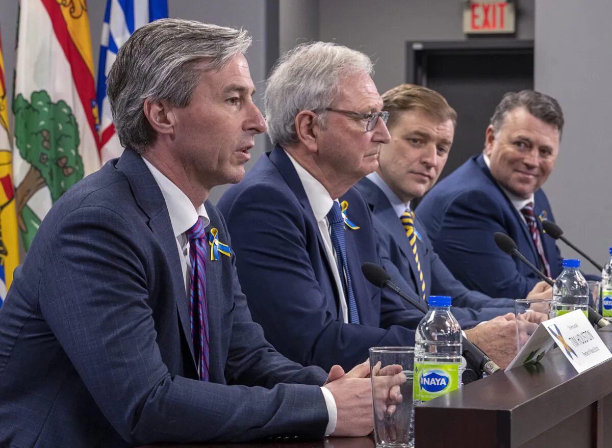 (L–R) Nova Scotia Premier Tim Houston, New Brunswick Premier Blaine Higgs, Newfoundland and Labrador Premier Andrew Furey, and Prince Edward Island Premier Dennis King field questions at the closing news conference at a meeting of the Council of Atlantic Premiers in Halifax on March 21, 2022. (Andrew Vaughan/The Canadian Press)