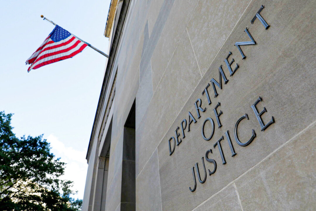 DOJ Charges 2 Suspected Chinese Agents for Targeting Falun Gong in US