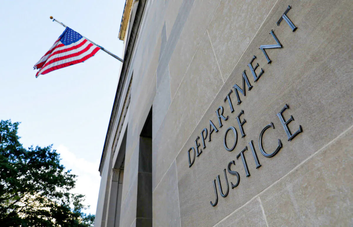 Signage at the U.S. Department of Justice headquarters in Washington on Aug. 29, 2020. (Andrew Kelly/Reuters)