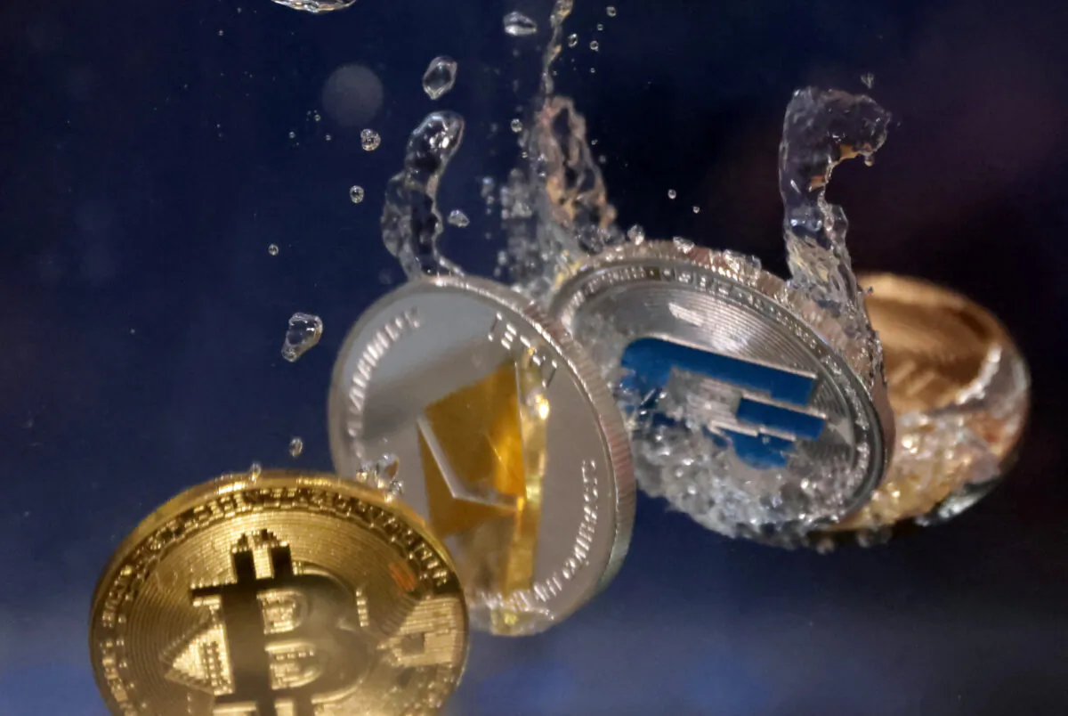 Representations of cryptocurrency Bitcoin, Ethereum, and Dash plunge into water in this illustration taken on May 23, 2022. (Dado Ruvic/Reuters/Illustration)