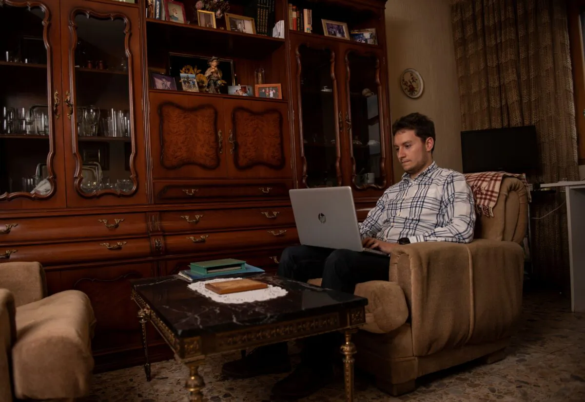 Spanish consultant Antonio Linaje works at his home in Villalba de Duero, Spain, on Dec. 4, 2020. (Pierre-Philippe Marcou/AFP via Getty Images)