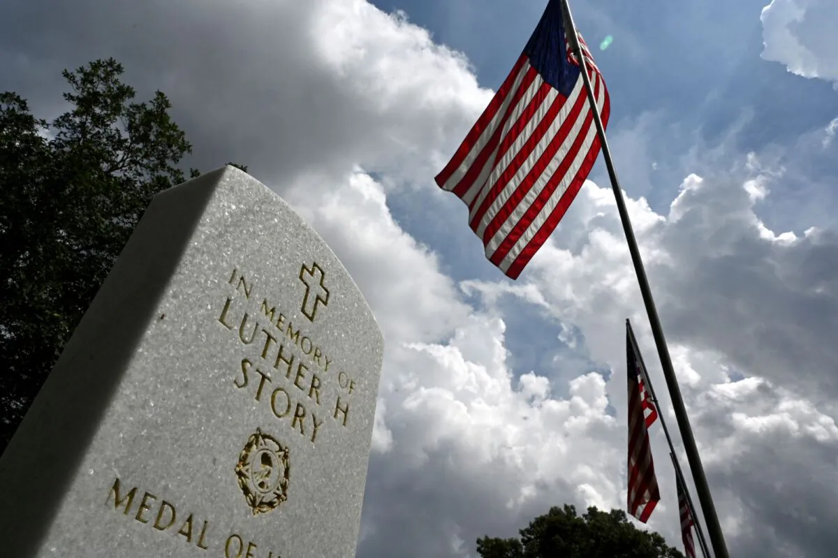 Headstone of Luther Story at Andersonville National Cemetery in Andersonville, Ga., on May 17, 2023. (Hyosub Shin/Atlanta Journal-Constitution via AP)