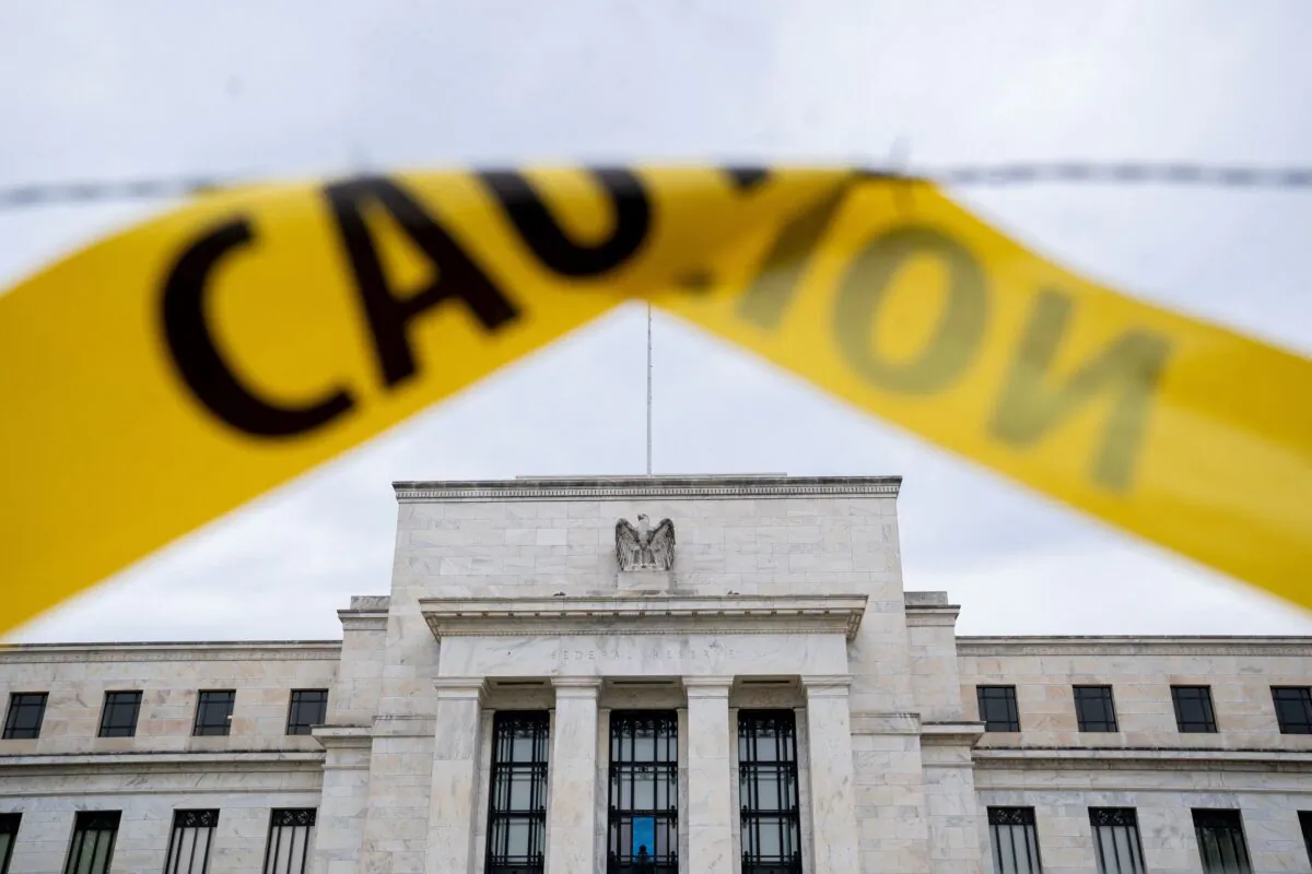 The U.S. Federal Reserve building is seen past caution tape in Washington, D.C., on Sept. 19, 2022. (Stefani Reynolds/AFP via Getty Images)