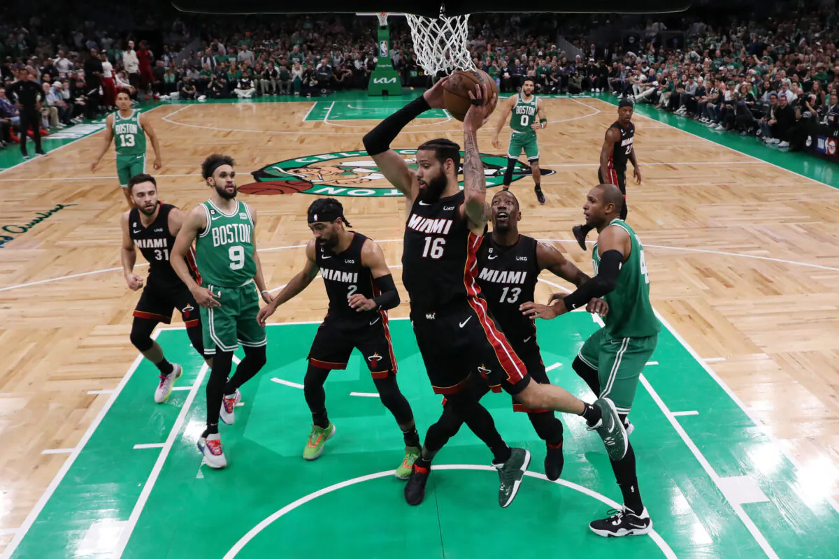Caleb Martin (16) of the Miami Heat rebounds the ball during the first quarter against the Boston Celtics in game seven of the Eastern Conference Finals at TD Garden in Boston on May 29, 2023. (Maddie Meyer/Getty Images)