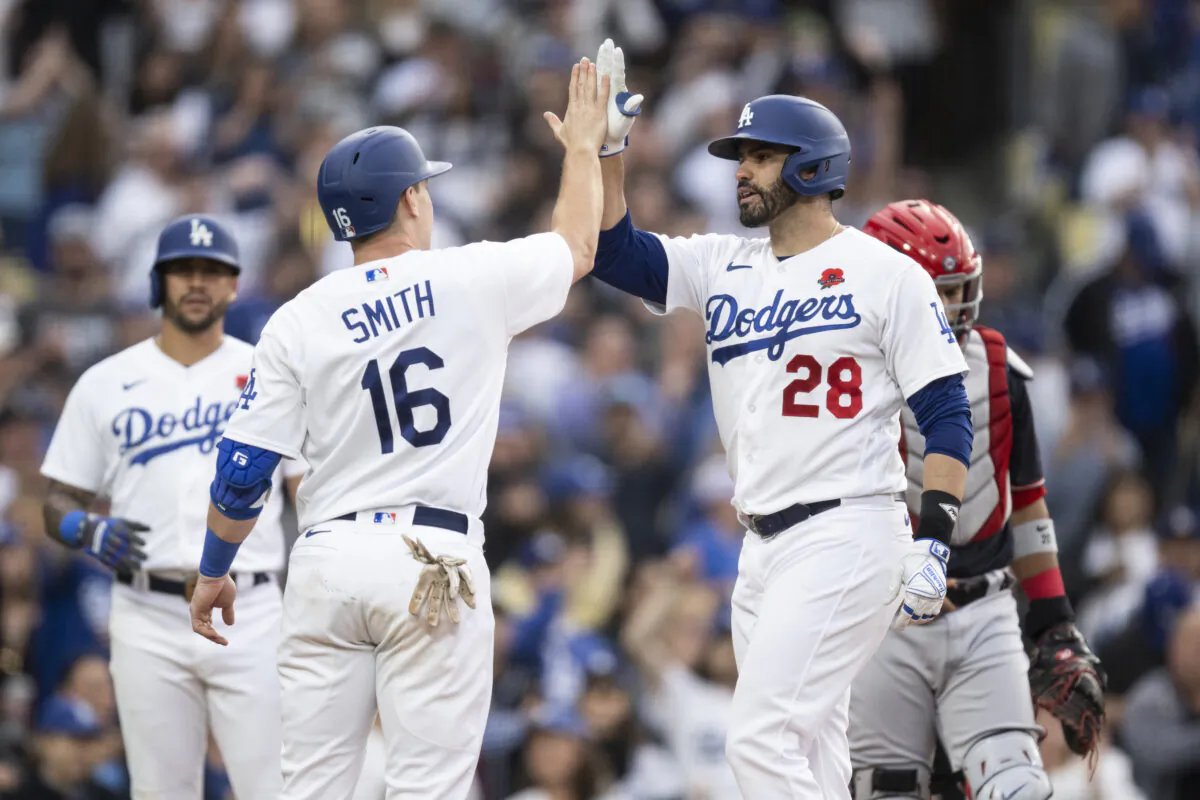 Los Angeles Dodgers designated hitter J.D. Martinez (28) celebrates after his three-run home run with Will Smith (16) during the fifth inning of a baseball game against the Washington Nationals in Los Angeles, on May 29, 2023. (Kyusung Gong/AP Photo)