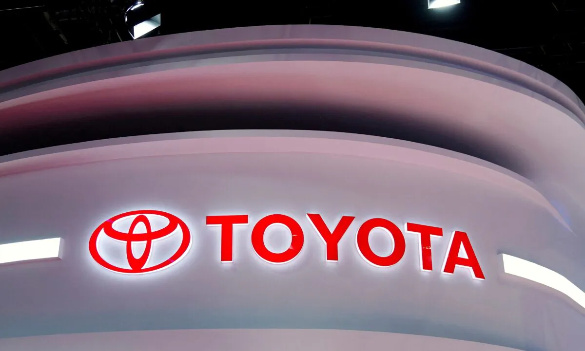 The Toyota logo at its booth during a media day for the Auto Shanghai show on April 19, 2021. (Aly Song/Reuters)