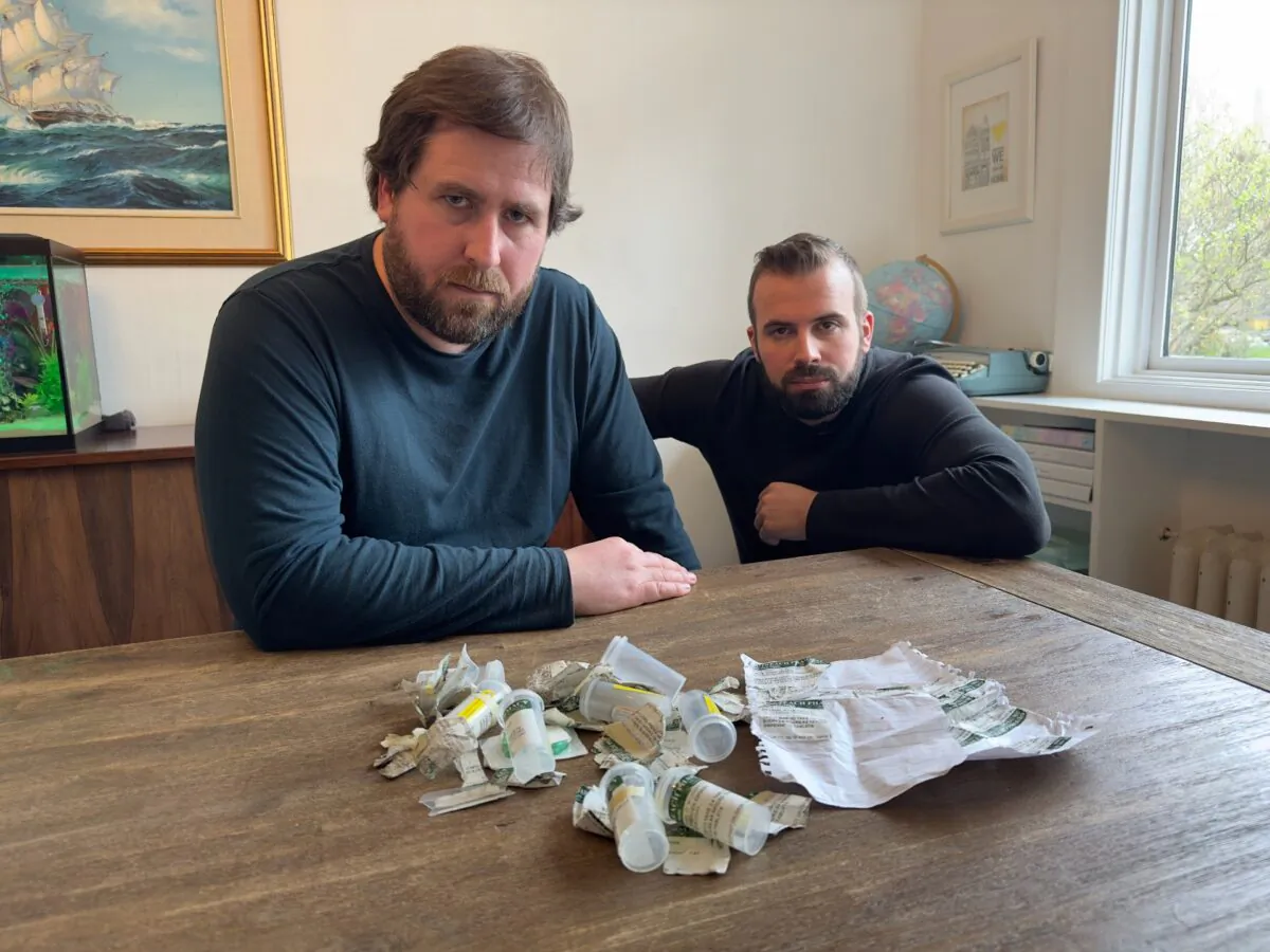 Filmmaker Aaron Gunn (R), sitting with Nanaimo, B.C., resident Collen Middleton, shows the littered evidence he regularly finds outside a nearby pharmacy where addicts are selling their "safer supply" drugs to other people. (Courtesy of Aaron Gunn)