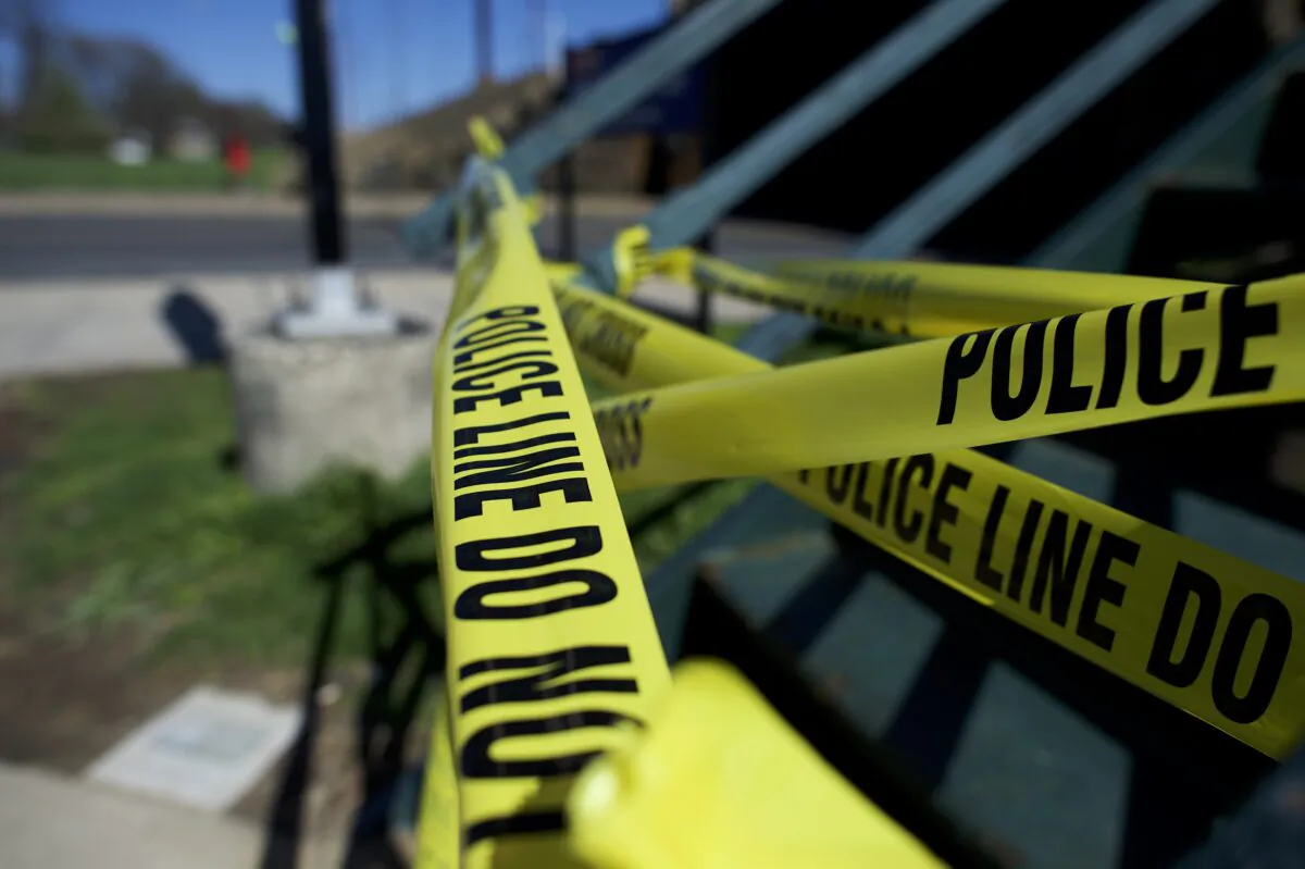 File photo of police tape closing the entrance of a train station. (Mark Makela/Getty Images)