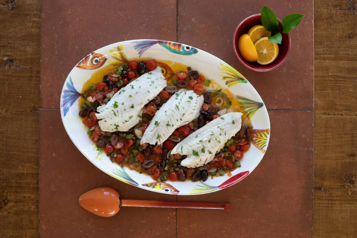 This one-skillet dish is an easy, flavorful way to prepare fish—and "I love the name," Gravely says. (Food Seen)