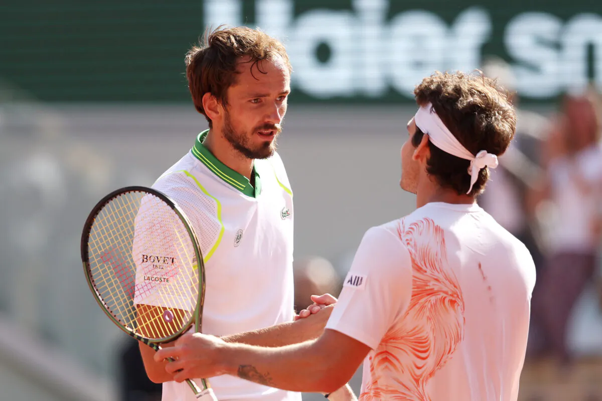 Daniil Medvedev shakes hands with Thiago Seyboth Wild of Brazil after their Men's Singles First Round Match on Day Three of the 2023 French Open at Roland Garros in Paris on May 30, 2023. (Julian Finney/Getty Images)