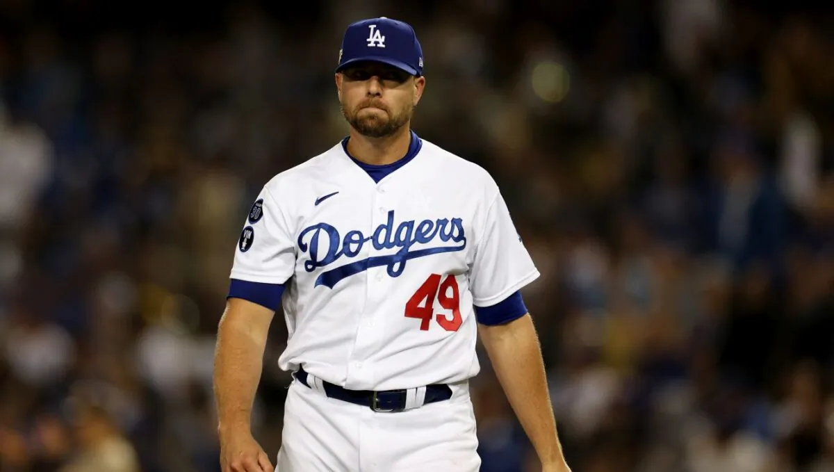 Blake Treinen #49 of the Los Angeles Dodgers looks on during the eighth inning in game two of the National League Division Series against the San Diego Padres at Dodger Stadium in Los Angeles, Calif., on Oct. 12, 2022. (Harry How/Getty Images)