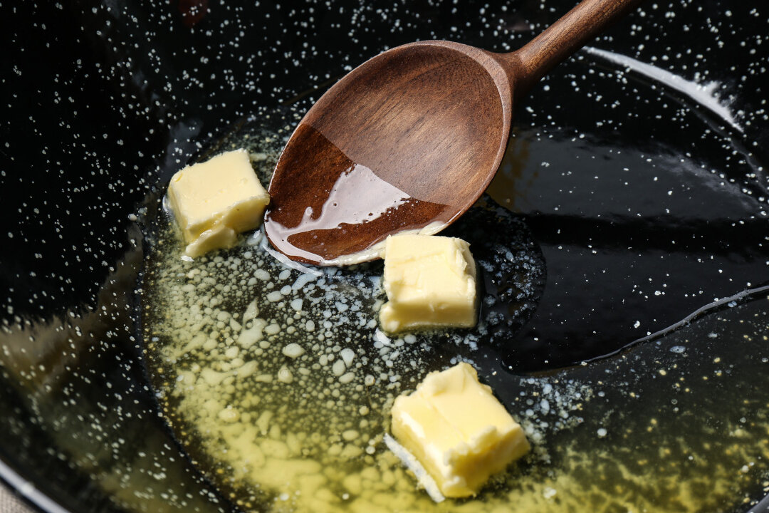 Frying pan with melting butter. (New Africa/Shutterstock)