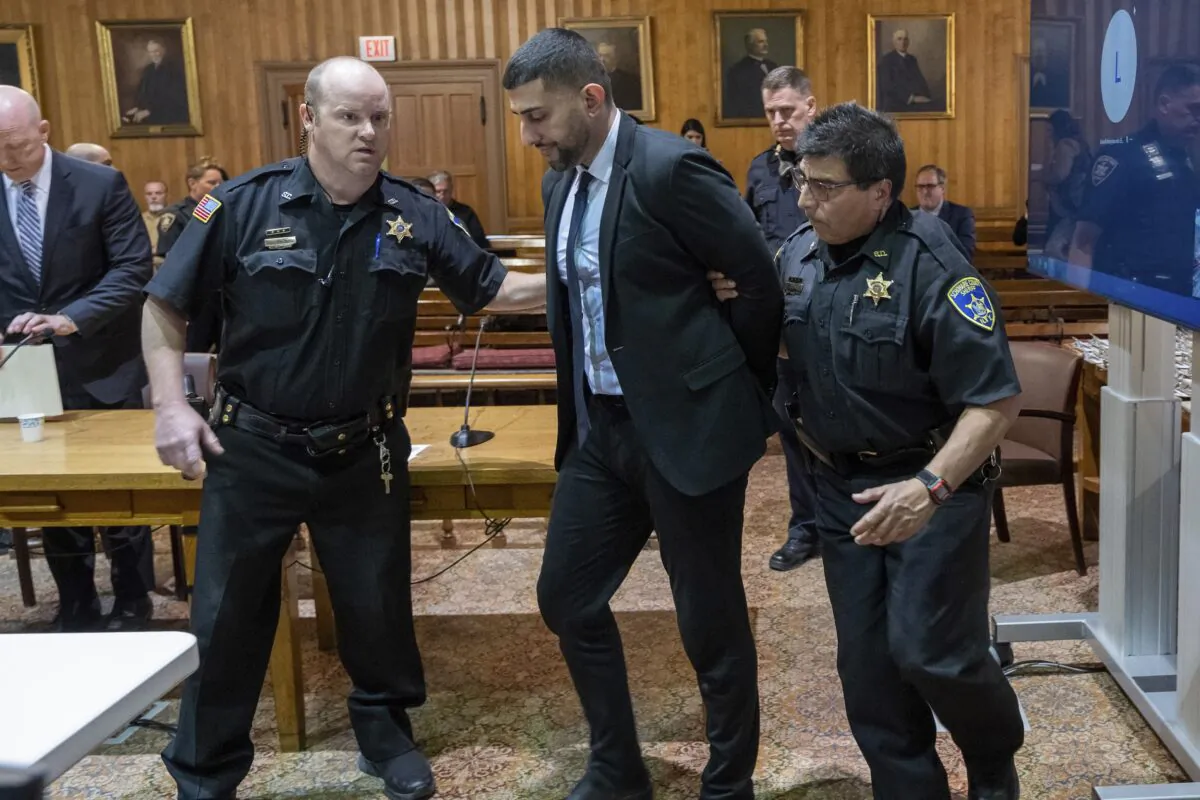 Nauman Hussain is taken into custody after he was found guilty in his trial at Schoharie County Court in Schoharie, N.Y., on May 17, 2023. (Jim Franco/The Albany Times Union via AP)