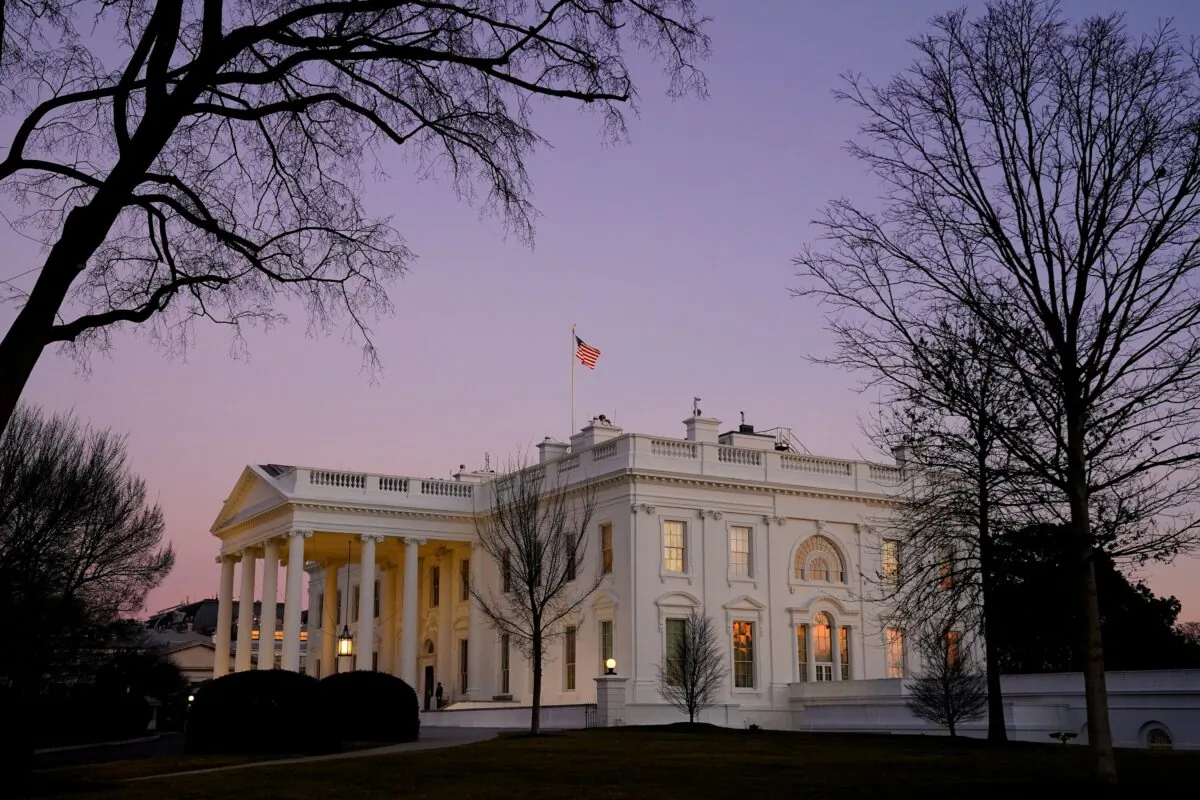 The White House at sunset on President Joe Biden's first day in office on Jan. 20, 2021. (Erin Scott/Reuters)