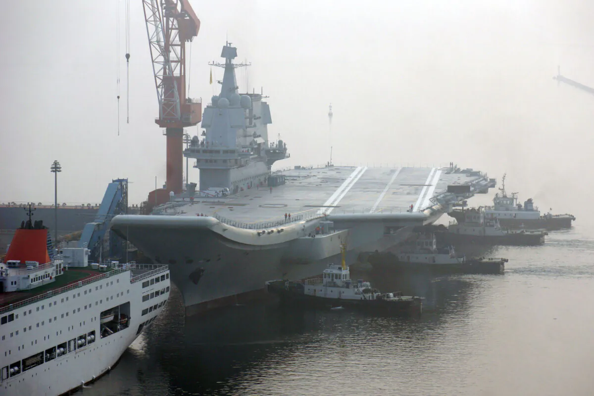 China's first home-built aircraft carrier sets out from a port of Dalian DSIC (Dalian Shipbuilding Industry Co.) Shipyard for sea trials in Dalian, Liaoning Province, China, on May 13, 2018. (Getty Images)