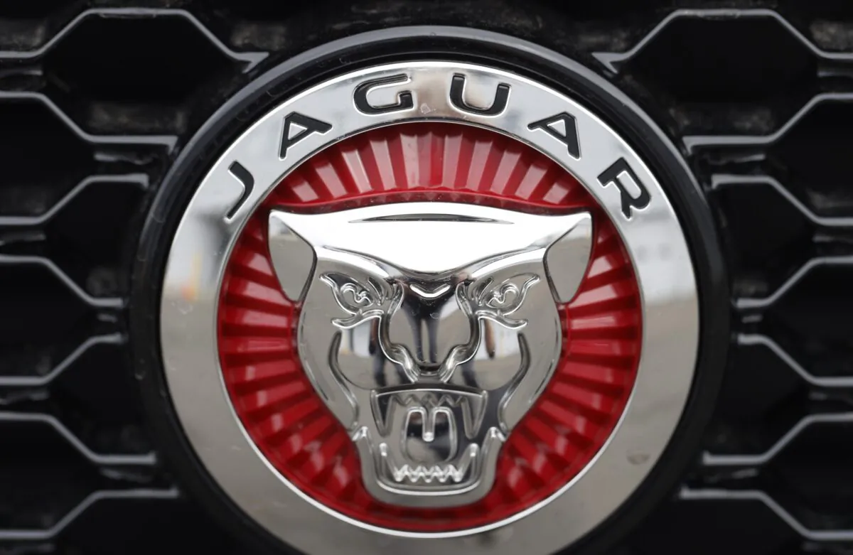 The Jaguar company logo on the grille of an unsold 2020 F-Pace sports-utility vehicle at a Jaguar dealership in Littleton, Colo., on April 26, 2020. (David Zalubowski/AP Photo)