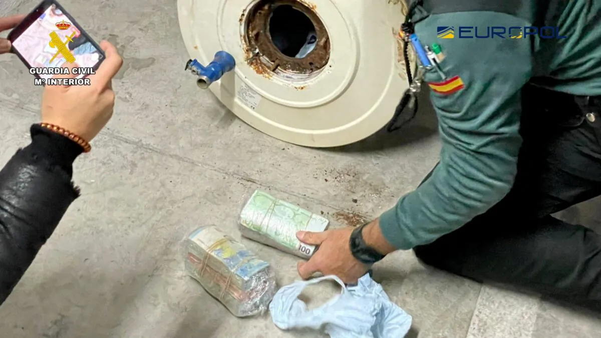 Packs of euro banknotes during a raid where more than 3.5 million packets of contraband tobacco were seized, in Seville, Spain, on Jan. 22, 2023. (Guardia Civil/Handout via Reuters)