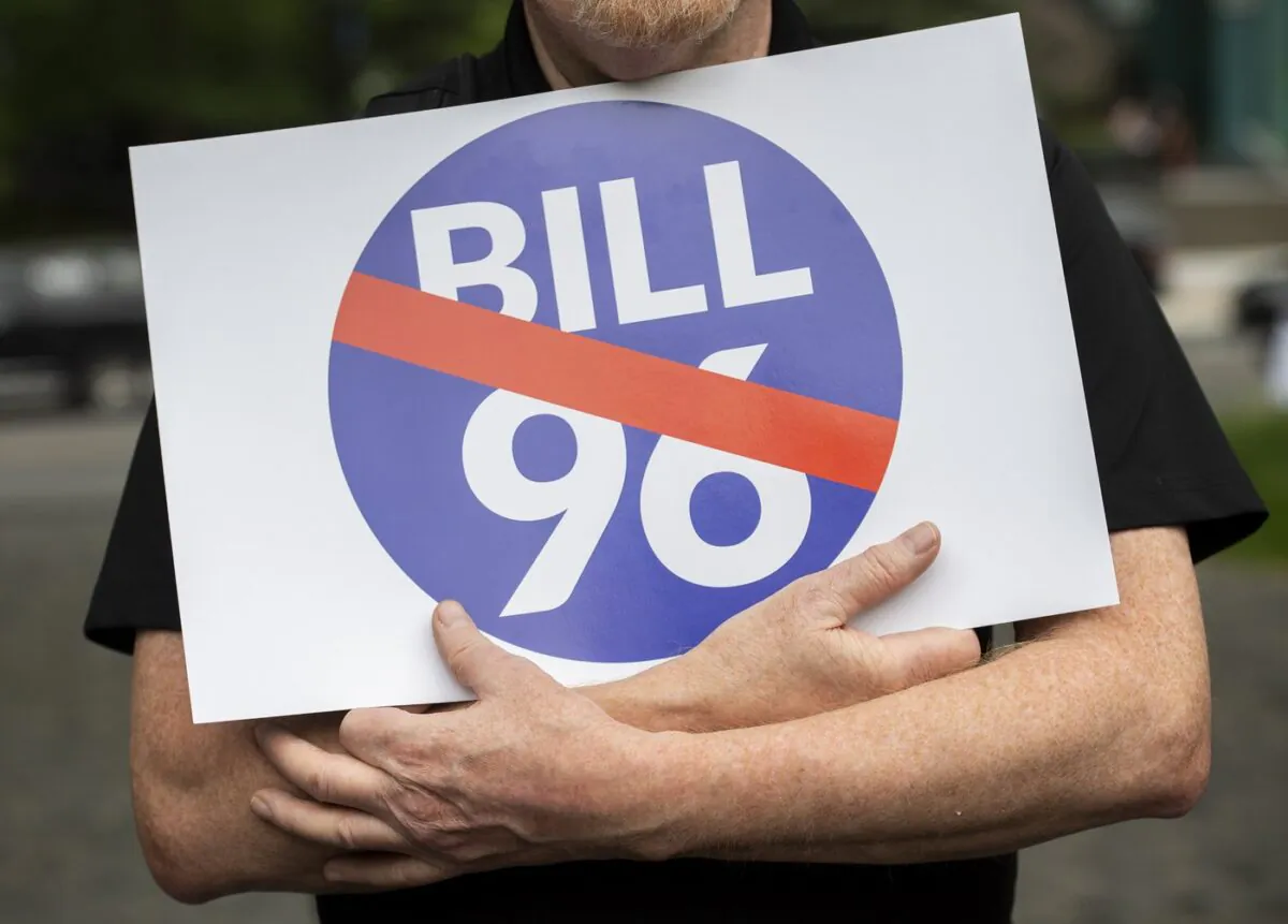 People take part in a protest against Bill 96 in Montreal, on May 26, 2022. (The Canadian Press/Graham Hughes)