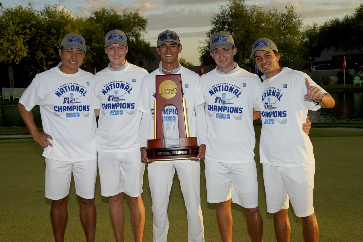Florida golfers pose for a photographers after winning the NCAA college men's match play golf championship against Georgia Tech in Scottsdale, Ariz., on May 31, 2023. (Matt York/AP Photo)