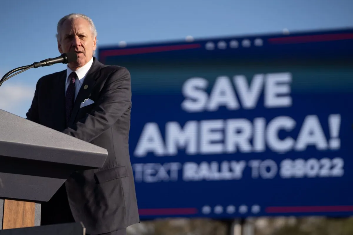South Carolina Gov. Henry McMaster speaks to a crowd during a rally with former President Donald Trump at the Florence Regional Airport in Florence, S.C., on March 12, 2022. (Sean Rayford/Getty Images)