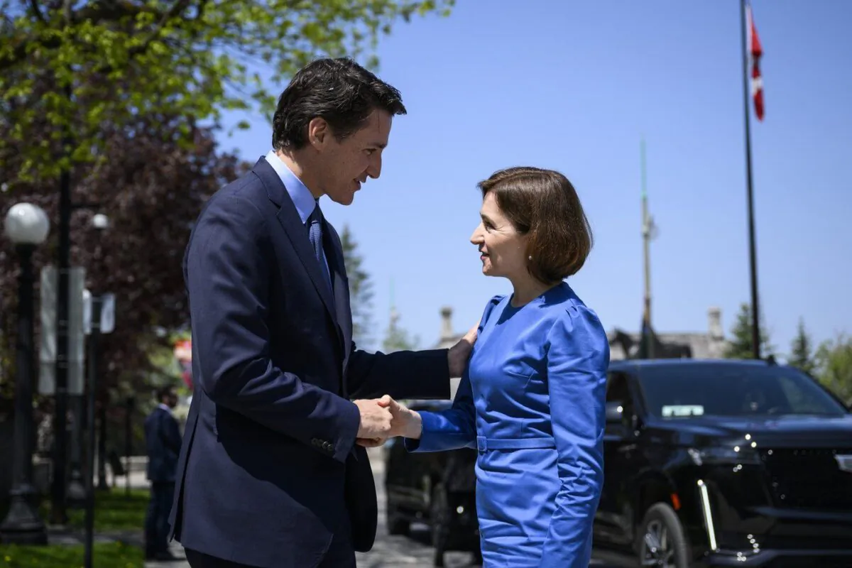 Canadian Prime Minister Justin Trudeau greets President of the Republic of Moldova Maia Sandu in Ottawa on May 11, 2023. (The Canadian Press/Justin Tang)