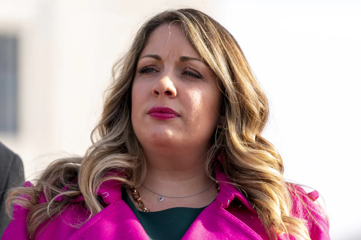 Lorie Smith, a Christian graphic artist and website designer in Colorado, appears outside the Supreme Court in Washington on Dec. 5, 2022. (Andrew Harnik/AP Photo)