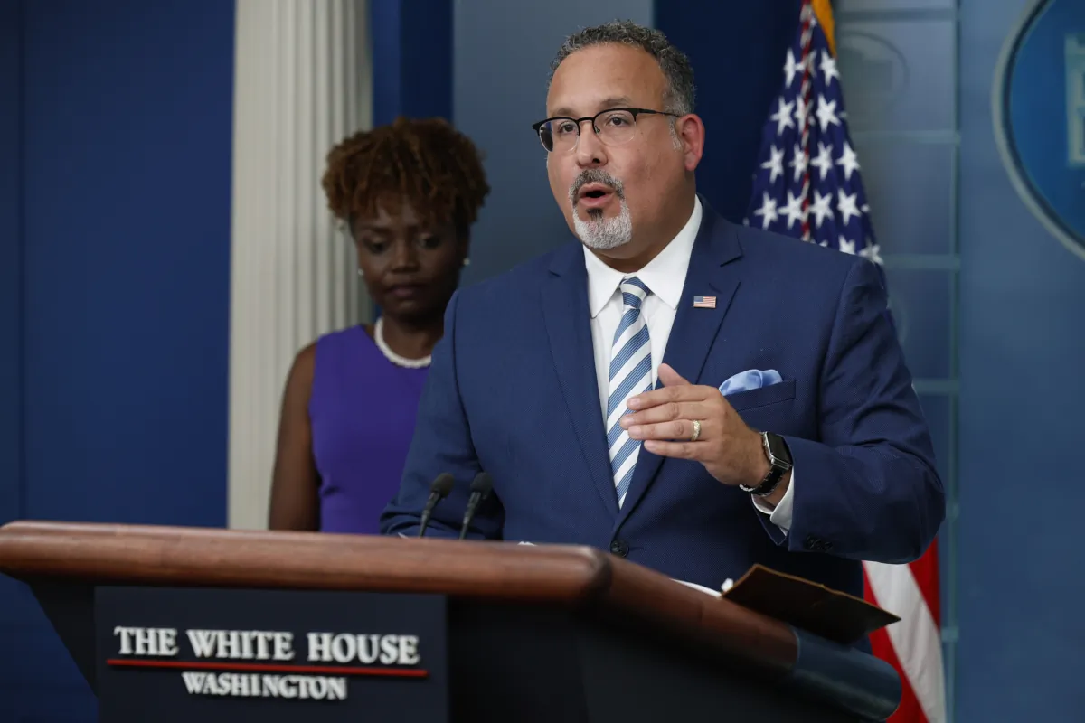 White House press secretary Karine Jean-Pierre (L) and Education Secretary Miguel Cardona talk to reporters during the daily news conference in the Brady Press Briefing Room at the White House on June 30, 2023. (Chip Somodevilla/Getty Images)