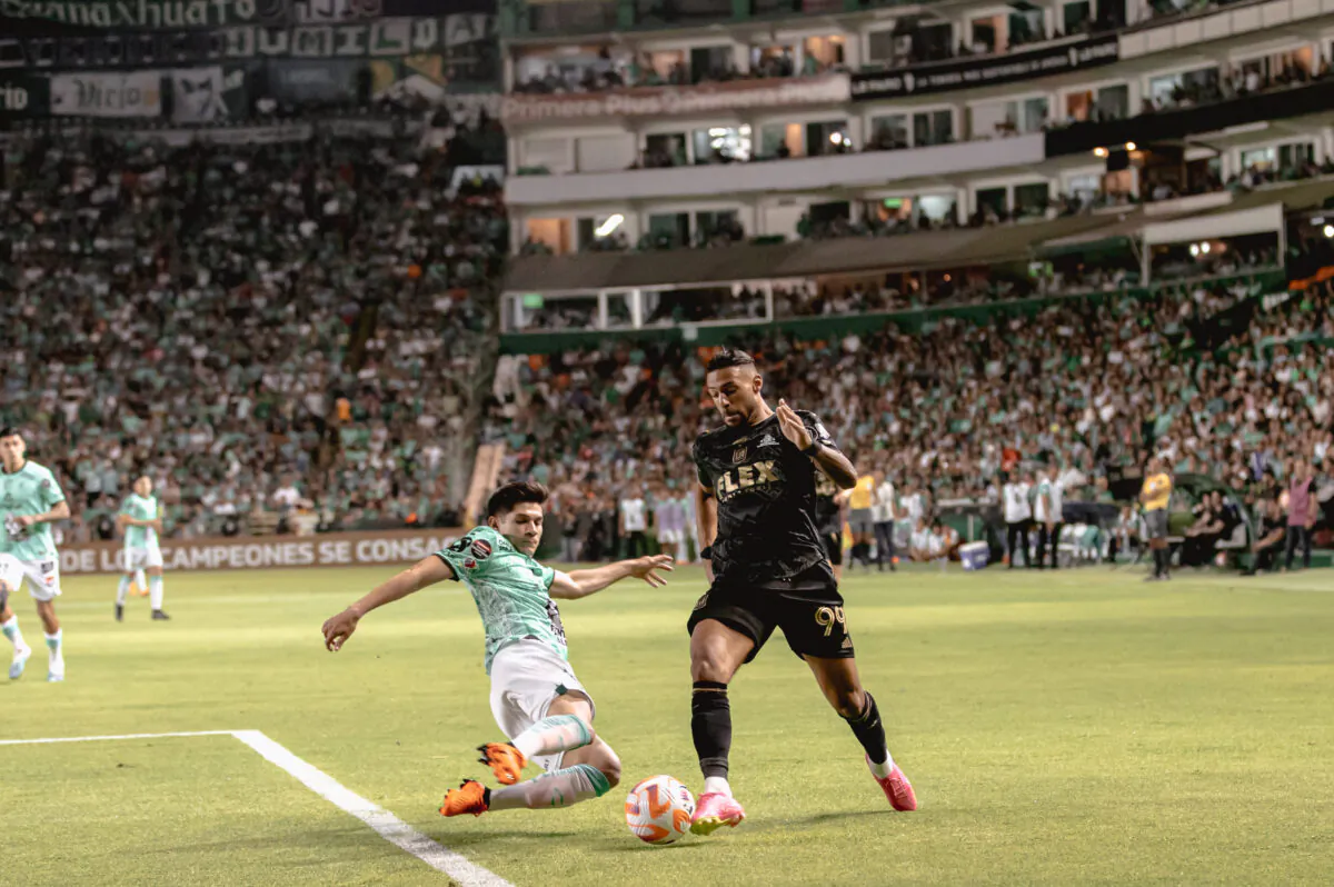 Los Angeles FC forward Denis Bouanga attempts to dribble past a Club Leon defender in the first leg of the CONCACAF Champions League championship at Estadio Leon in Leon, Guanajuato, Mexico on May 31, 2023. (Courtesy of Los Angeles FC via The Epoch Times)