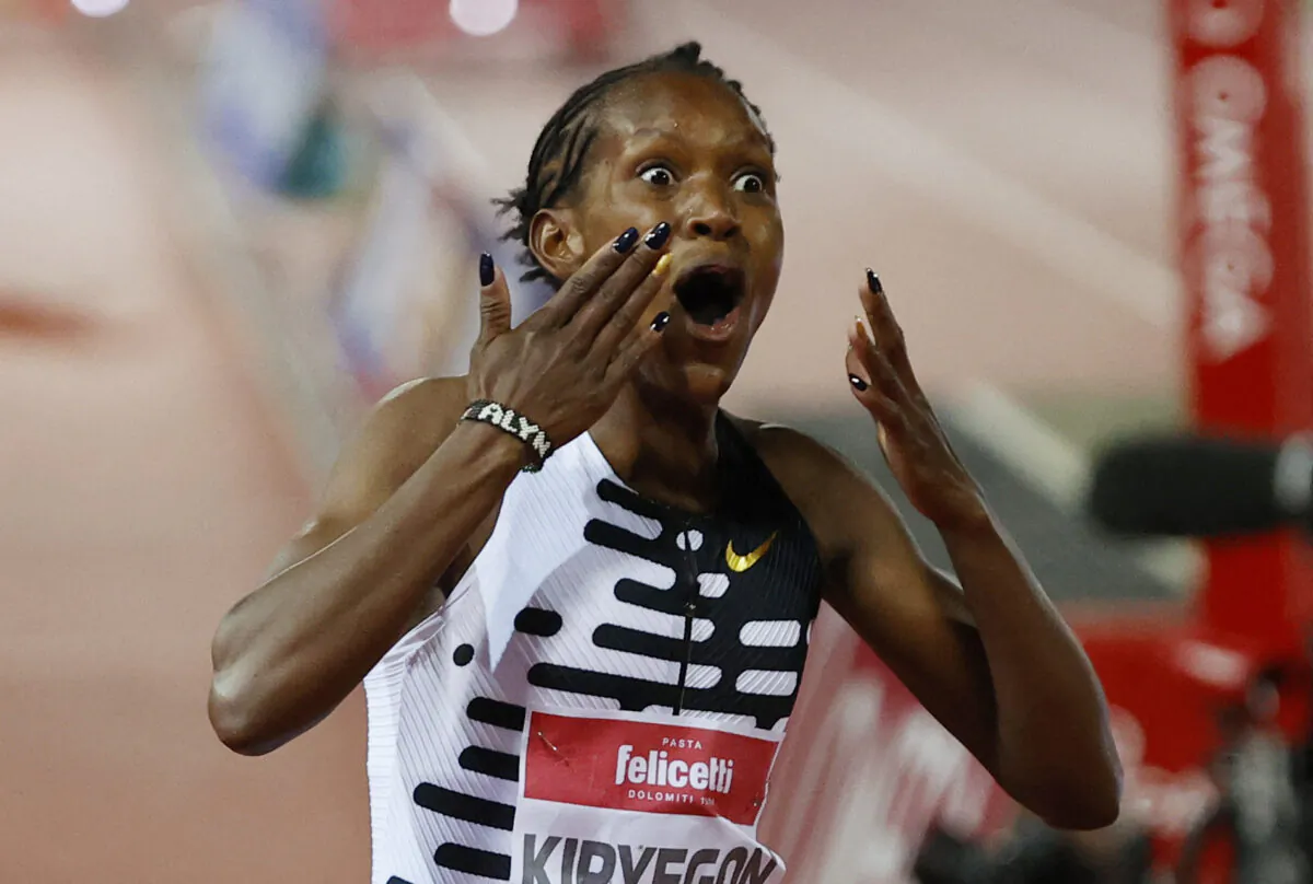 Kenya's Faith Kipyegon celebrates winning the women's 1500m final and setting a new world record during the Wanda Diamond League 2023 Golden Gala at Stadio Luigi Ridolfi in Florence, Italy, on June 2, 2023. (Ciro De Luca/Reuters)