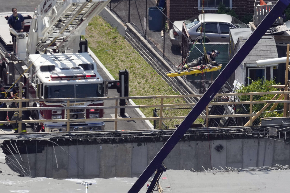 NextImg:8 Construction Workers Injured as Building Partially Collapses During Concrete Mishap in New Haven
