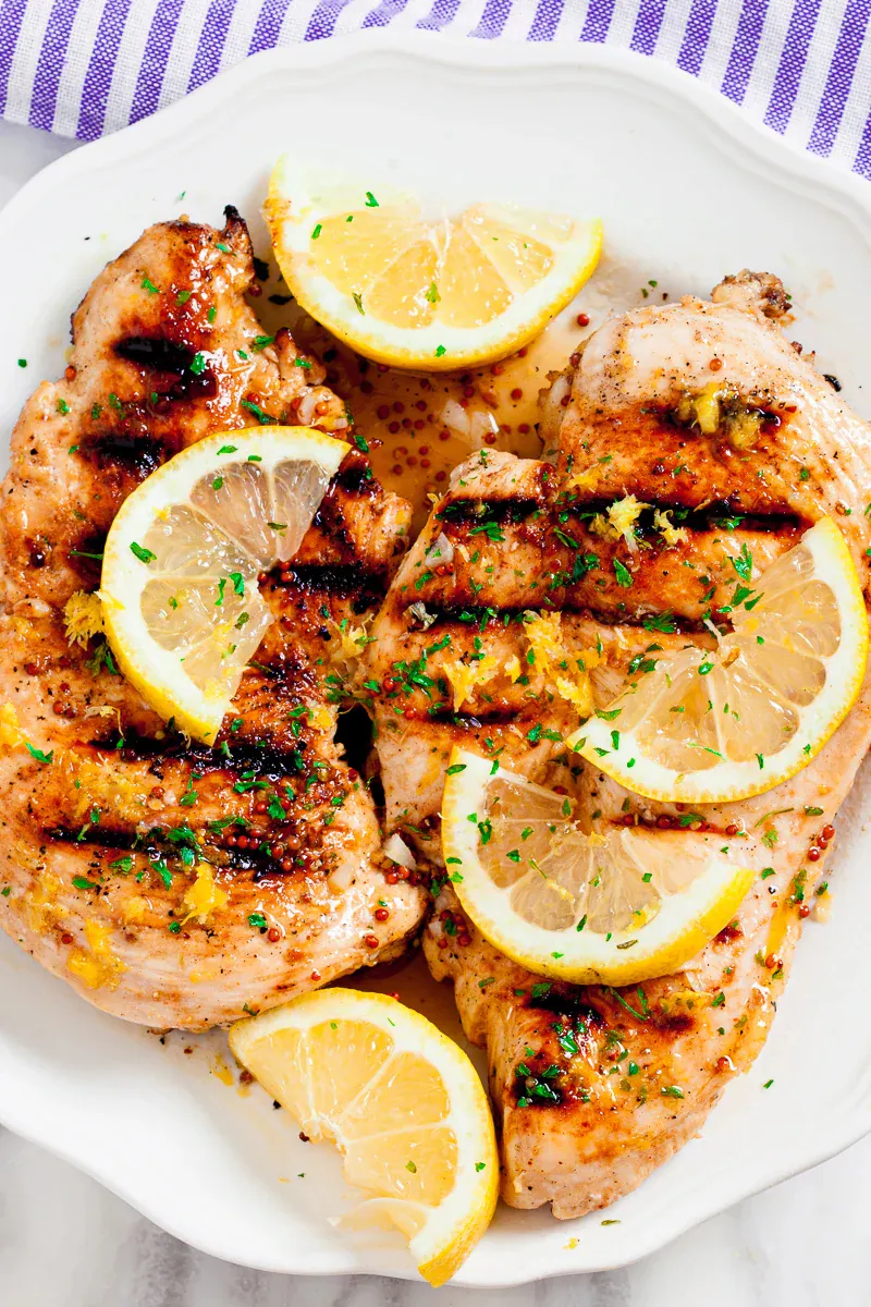 Marinate chicken in an olive oil and lemon blend, and cook it on the grill for the juiciest chicken recipe you’ll ever taste. (Courtesy of Amy Dong)