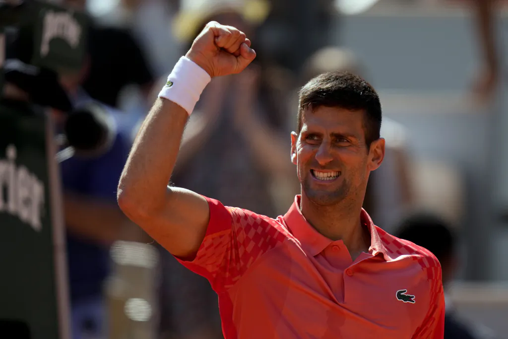 Serbia's Novak Djokovic celebrates winning his fourth round match of the French Open tennis tournament against Peru's Juan Pablo Varillas at the Roland Garros stadium in Paris on Jun. 4, 2023. (Thibault Camus/AP Photo)