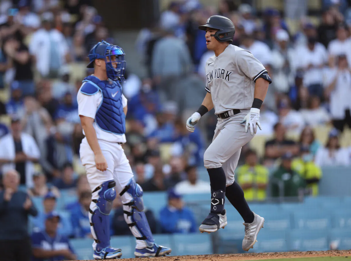 Anthony Volpe (11) of the New York Yankees celebrates his two run homerun past Will Smith (16) of the Los Angeles Dodgers, to take a 4–1 lead, during the ninth inning at Dodger Stadium in Los Angeles on June 04, 2023. (Harry How/Getty Images)
