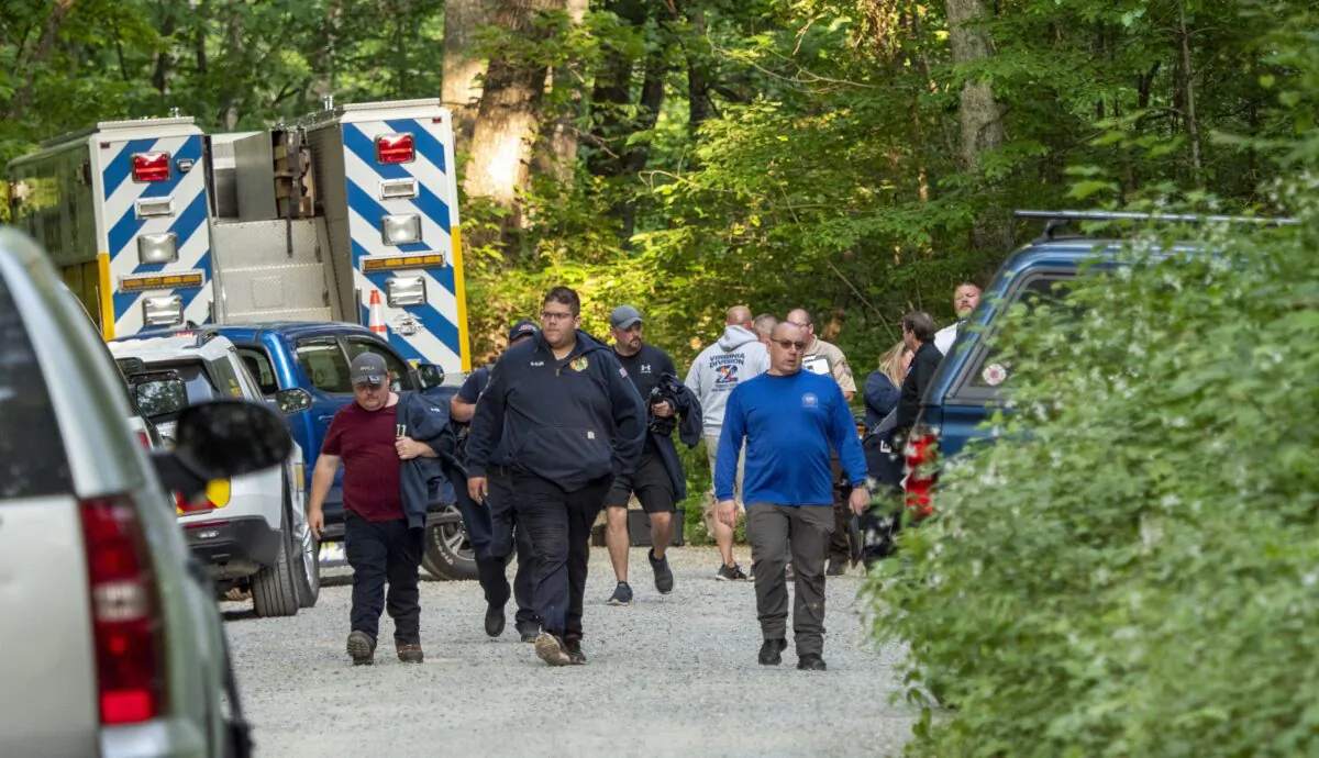 Search and rescue teams leave the command post at St. Mary's Wilderness en route to the Blue Ridge Parkway to search for the site where a Cessna Citation crashed over mountainous terrain near Montebello, Va., on June 4, 2023. (Randall K. Wolf via AP)