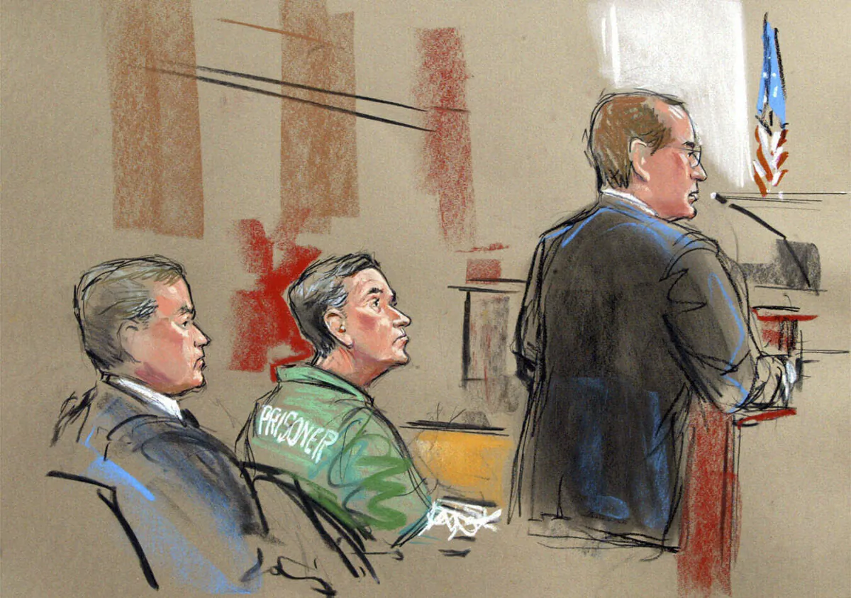 An artist's depiction of U.S. Attorney Randy Bellows (R) addresses the court during the sentencing of convicted spy Robert Hanssen (C) with his attorney Plato Cacheris (L) at the federal courthouse in Alexandria, Va., on May 10, 2002. (William Hennessy, Jr. via AP)