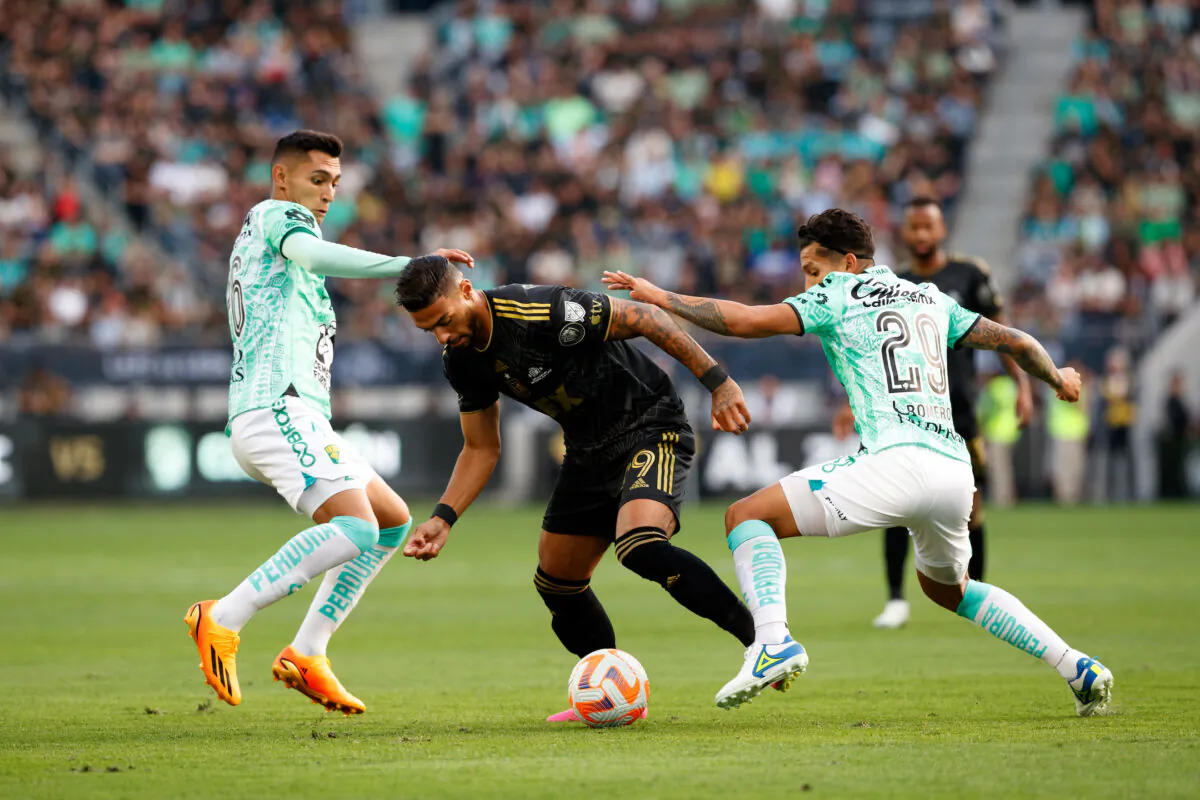Los Angeles FC forward Denis Bouanga dribbles between two Leon players in the second leg of the CONCACAF Champions League championship at BMO Stadium in Los Angeles on Jun 4, 2023. (Courtesy of LAFC via The Epoch Times)