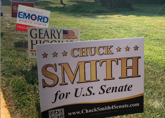 Campaign signs outside the Loudoun County Republican Committee’s Summer Jamboree, in Purcellville, Va., on June 2, 2023. (Masooma Haq/The Epoch Times)