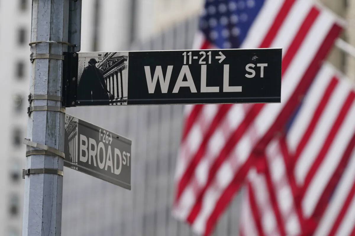 A street sign in front of the New York Stock Exchange on June 14, 2022. (Seth Wenig/AP Photo)