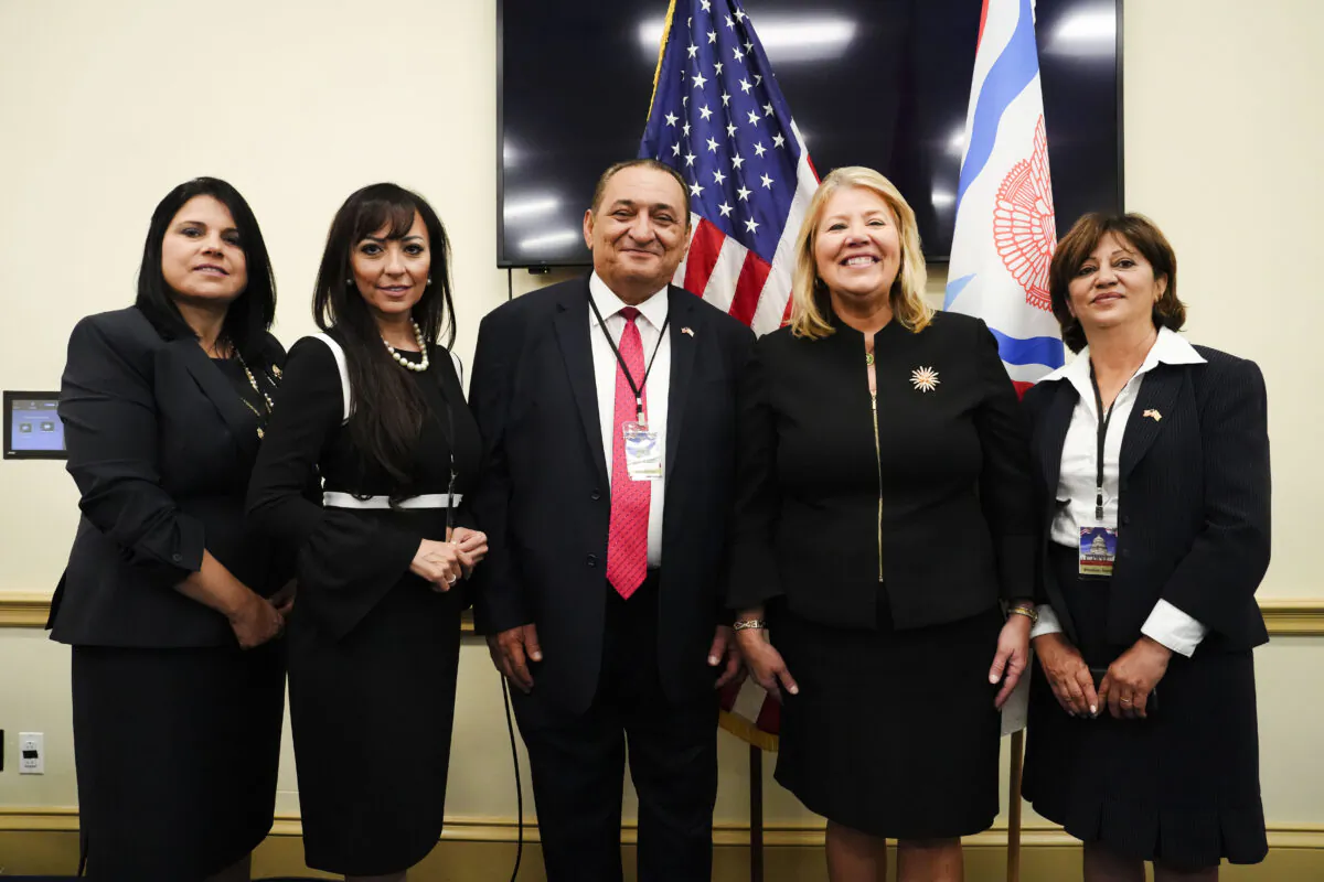Members of Assyrian advocacy organizations, joined by Rep. Debbie Lesko (R-Ariz.), pose for a photo in Washington on June 6, 2023. (Madalina Vasiliu/The Epoch Times)