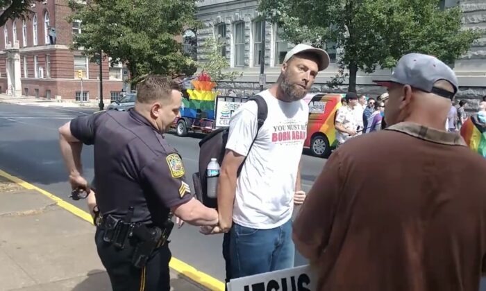 Christian Arrested While Preaching in Public