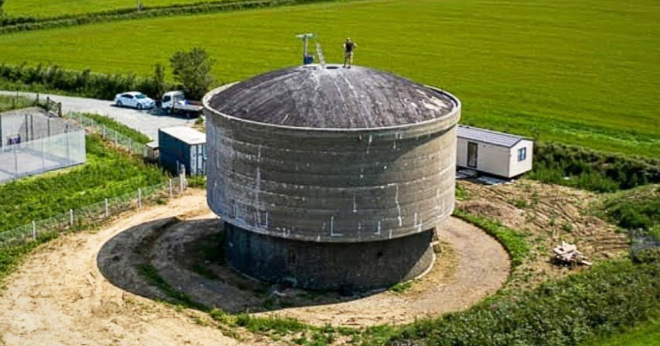 NextImg:Man transforms abandoned 1940s water tower into $2.5 million luxury home—here’s how it looks inside